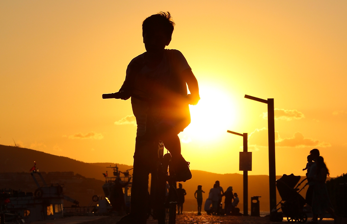 bambino in bici
