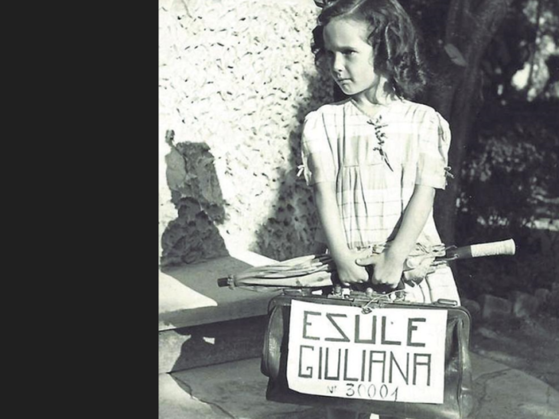 La bambina con la valigia