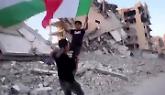È il giorno della pace. Le bandiere d’Italia e Palestina sventolano tra le macerie di Gaza (VIDEO)