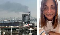 Elisa Marchese e lo skyline di Dubai sotto le bombe