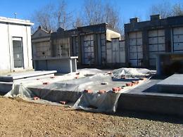 RONDISSONE. Qui le tombe del cimitero si allagano...