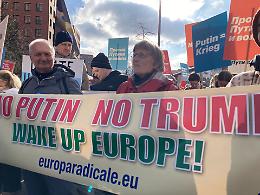 “No Putin, No Trump”: Berlino e Milano in piazza, l’Europa si sveglia contro i crimini russi