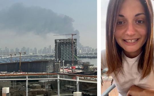 Elisa Marchese e lo skyline di Dubai sotto le bombe